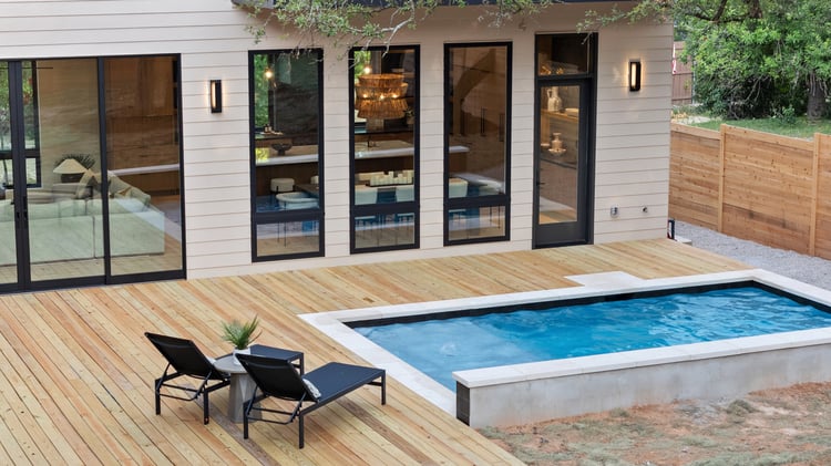 Backyard deck area featuring modern plunge pool in Austin, TX