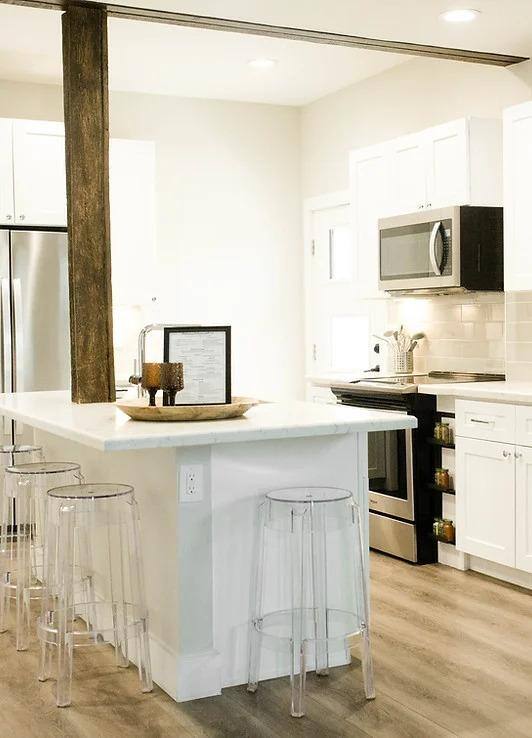 Remodeled kitchen view of island and barstools by J. Angelo Design Build