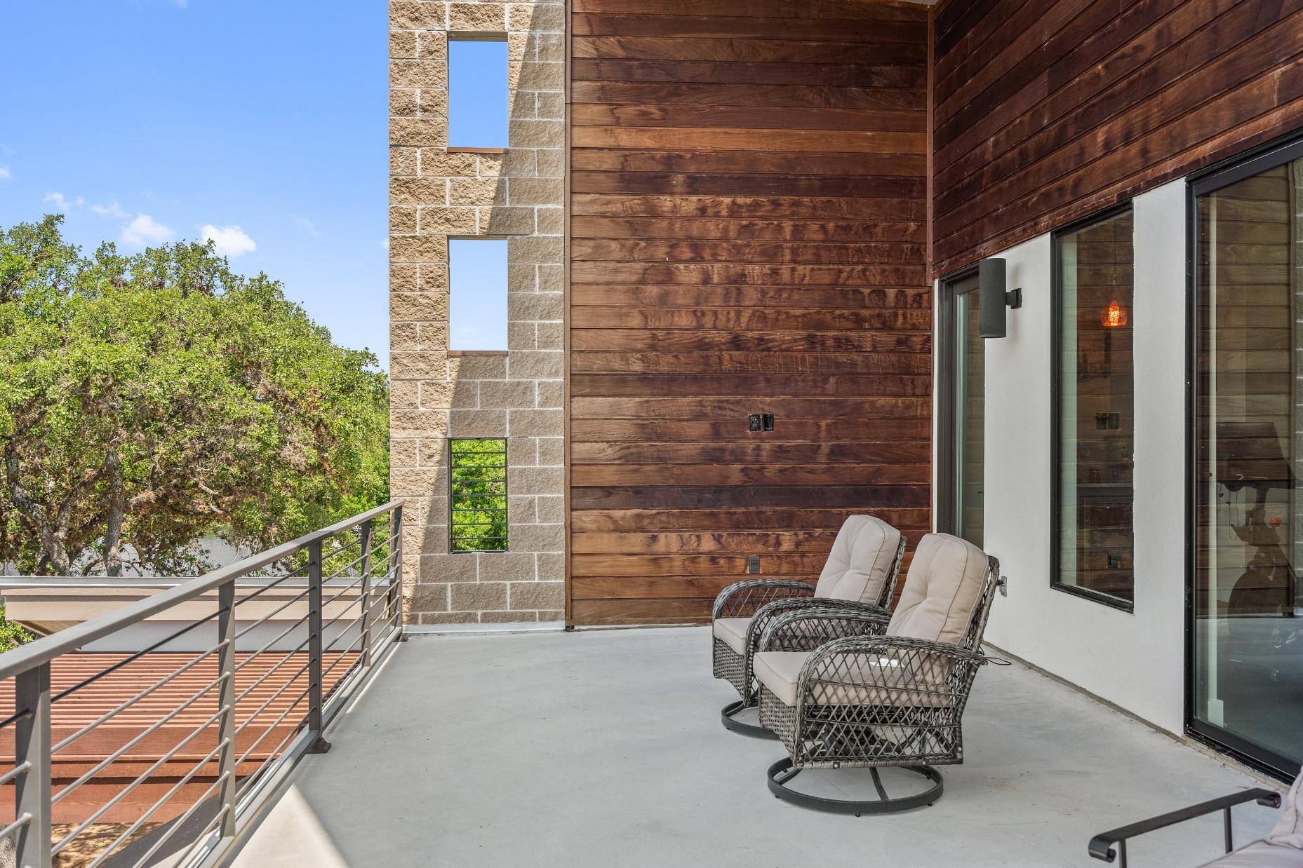 Back balcony overlooking Lake LBJ Flagship custom home in Austin, TX by J. Angelo Design Build