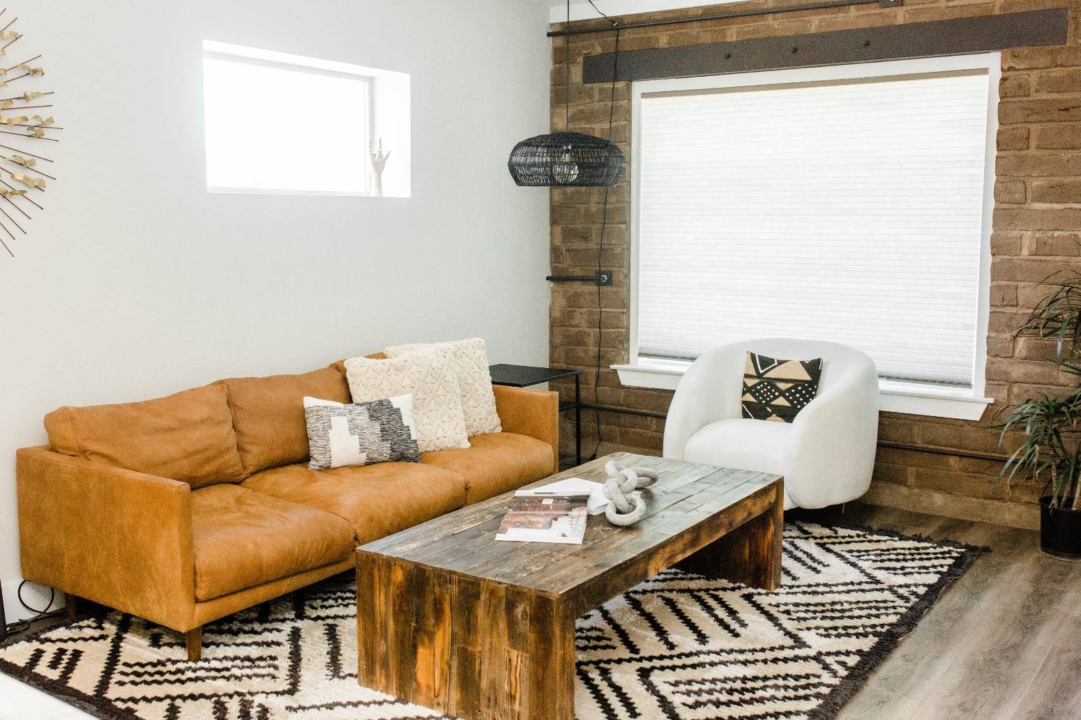 Remodeled living room with neutral design by J. Angelo Design Build